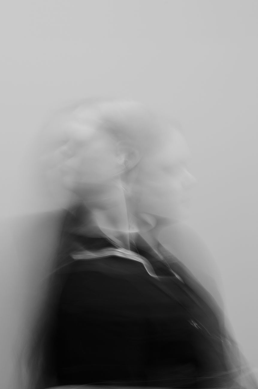grayscale photo of woman in black shirt