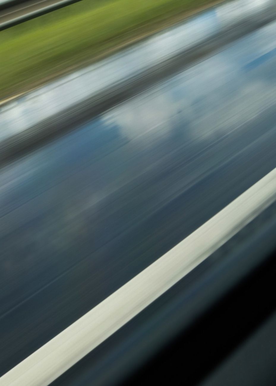 blurred road and lawn
