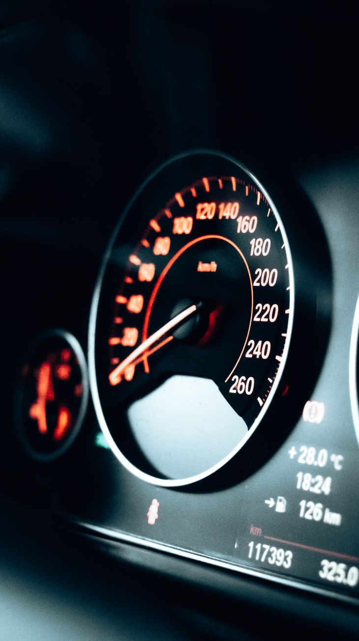close up of the speedometer in a car