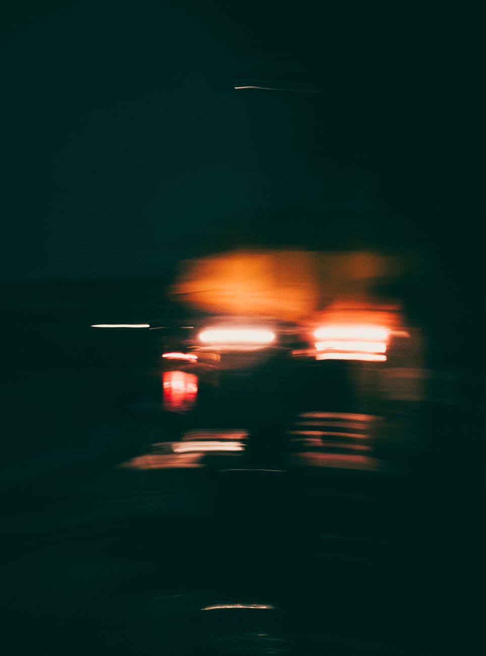 dark photo of blurred lights