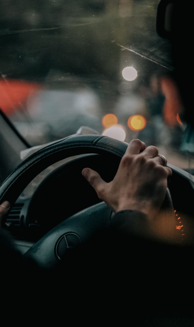 hand on steering wheel