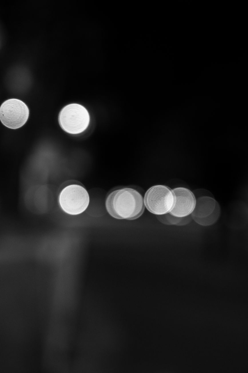 grayscale photo of bokeh lights