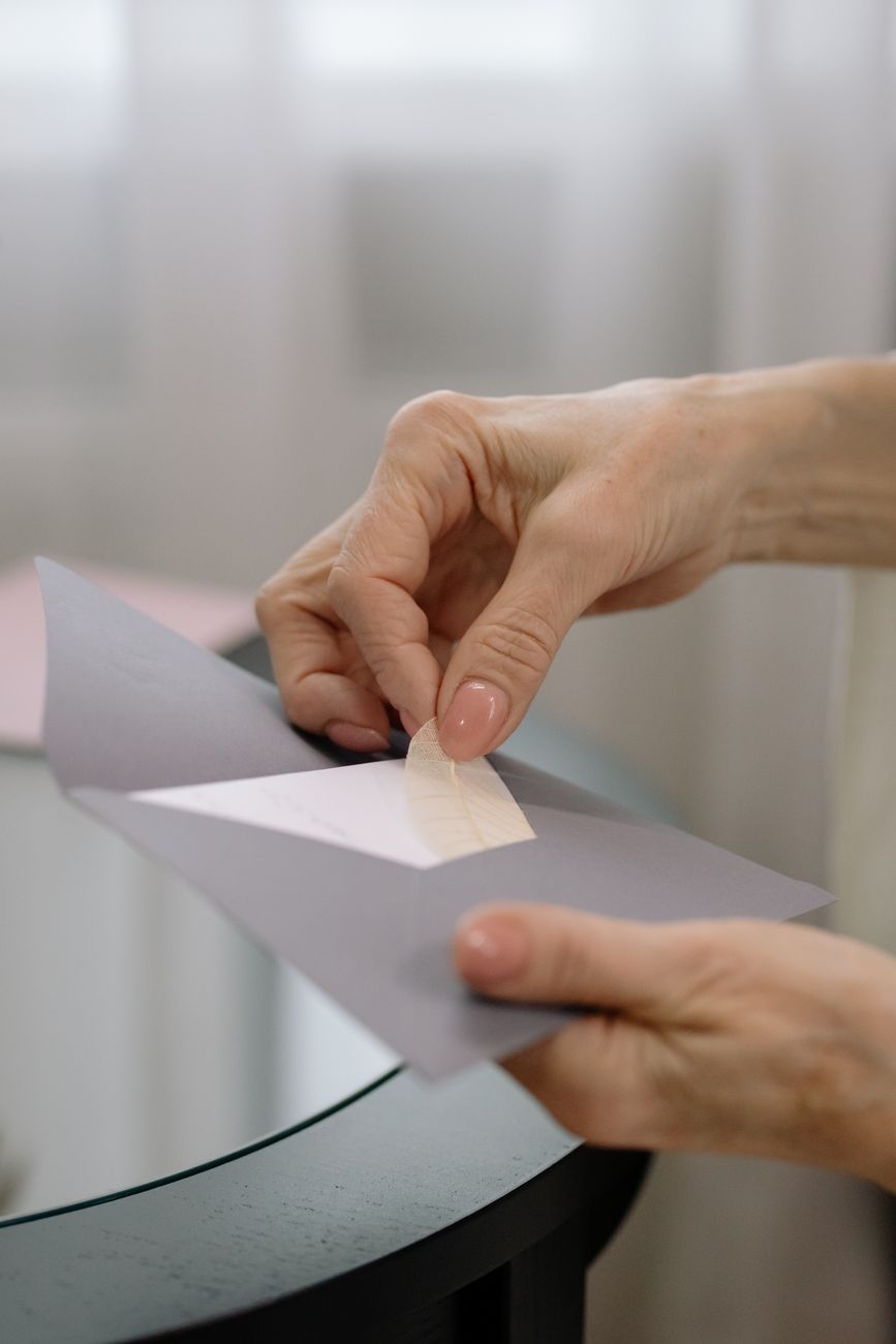 a person holding an envelope