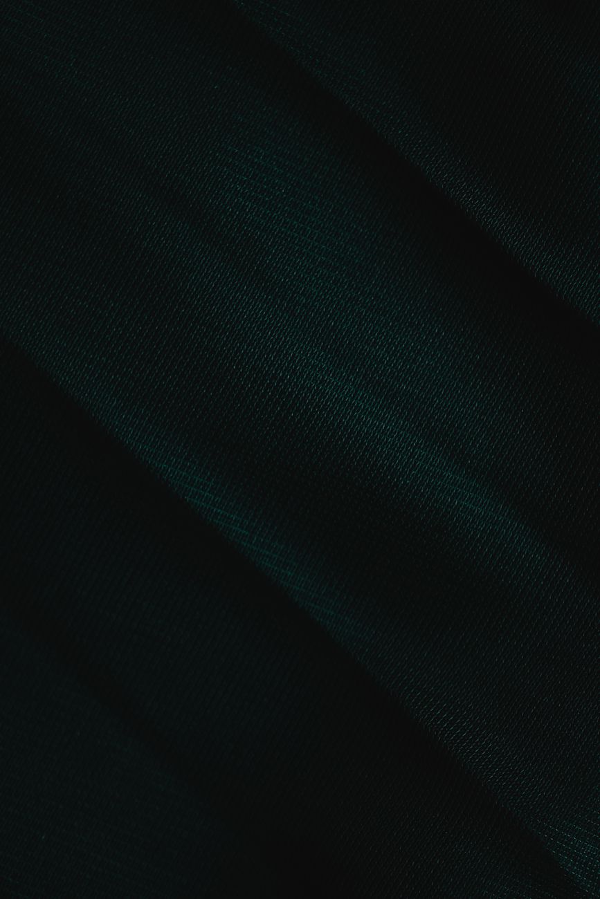 close up shot of green fabric