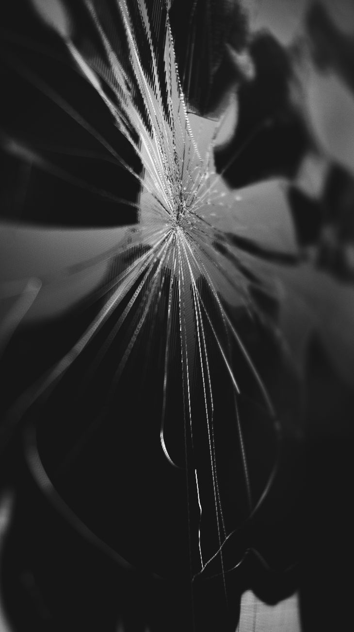 cracked glass in black and white
