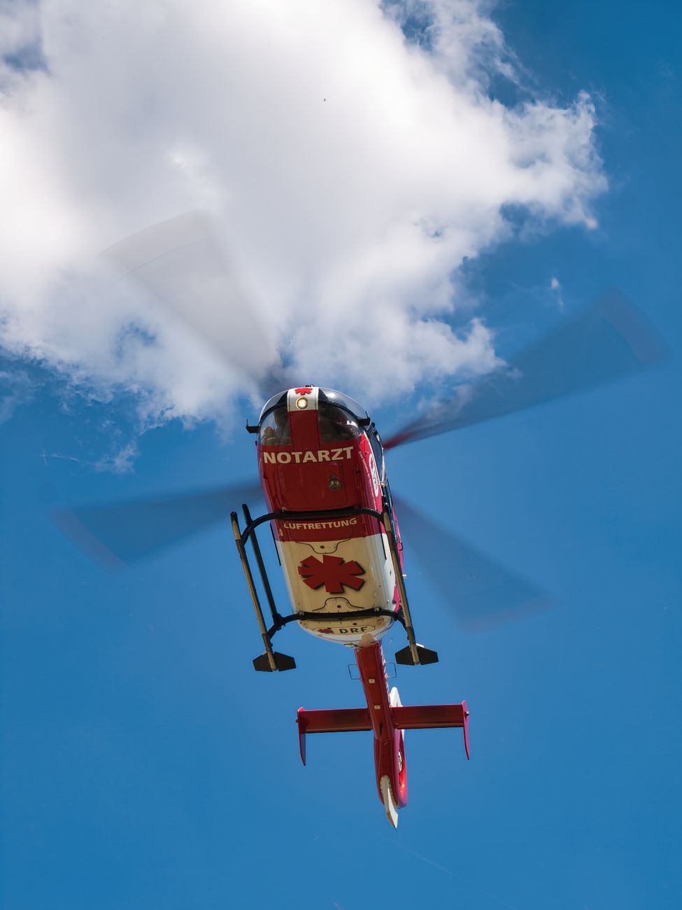 emergency rescue helicopter against blue sky